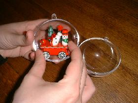 open the transparent ball and meet with various figurines (or stuffed animals according to your desires)