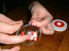 close the ball and make a double knot with different length of wire